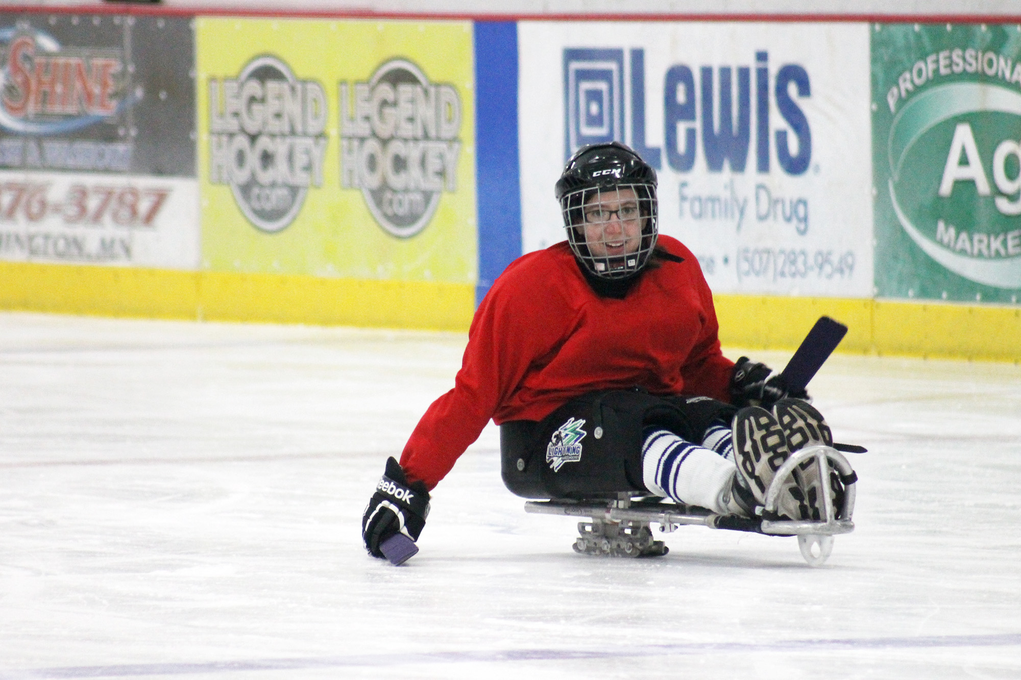 Katie Fick of Luverne skates with the Siouxland Lightning sled hockey team April 7, when the group came to the Blue Mound Ice Arena for the first time to practice. Mavis Fodness/Rock County Star Herald Photo