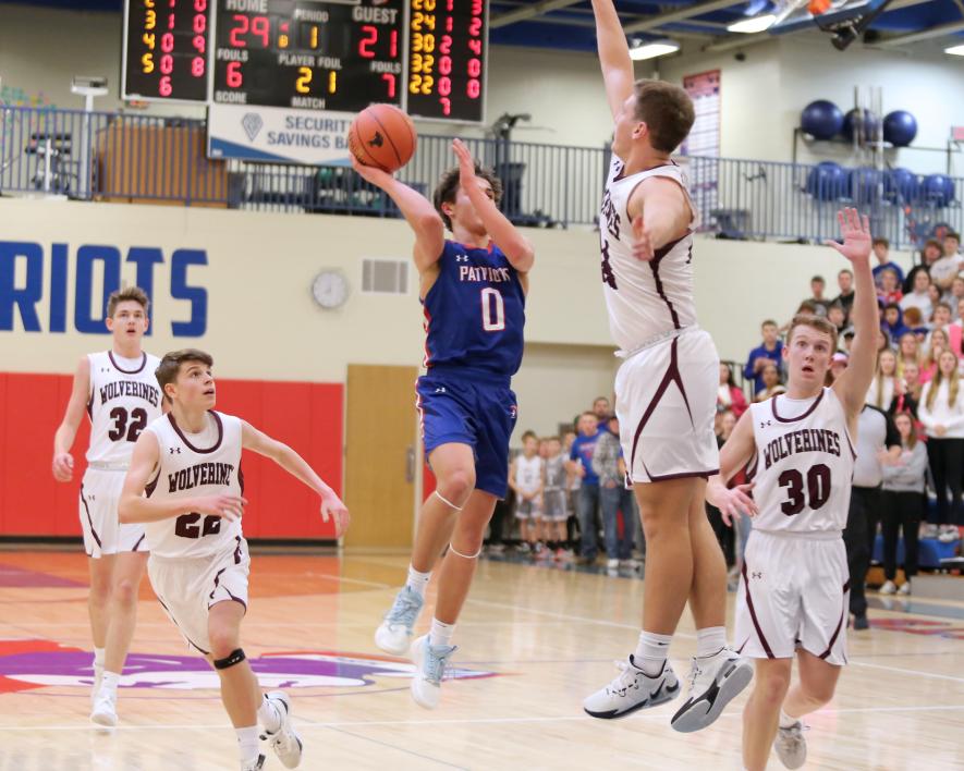 Micah Bush, H-BC sophomore, goes airborne for a layup against Mountain Lake Thursday, Jan. 18. The Patriots fell in a 62-54 game at home.