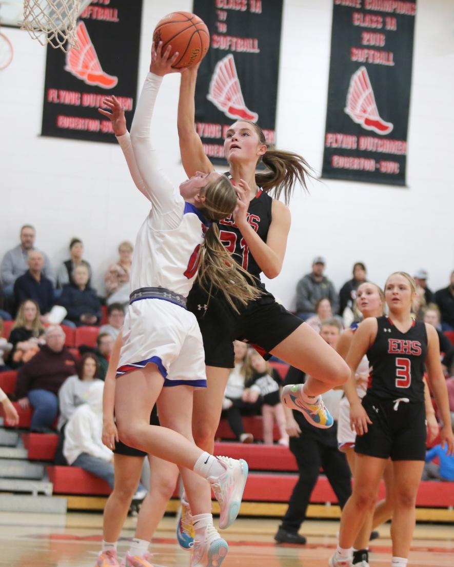 Sophomore Abbie Harris is fouled on a layup in Adrian Monday, Jan. 22. H-BC fell 56-50 to the Dutchmen.