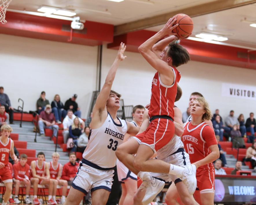 Rock CountyJunior Carter Sehr goes up over the outstretched arm of a Jackson player for a basket Tuesday, Jan. 16, in Luverne. The Cardinals fell to Jackson 80-69 in the contest.  Star Herald Photo