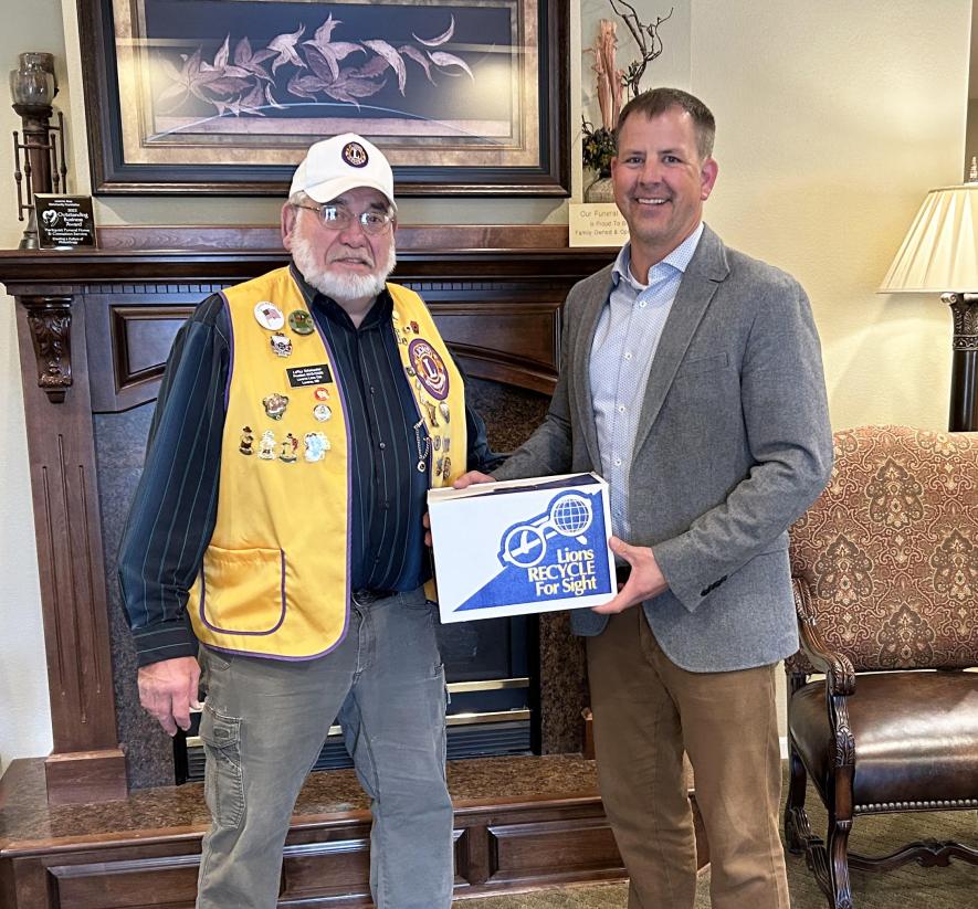 Hartquist Funeral Home, Luverne, is a collection point for the “Lions Recycle for Sight” program, which collects used eyeglasses for Lions Club International. LeRoy Schomacker (left) with the Luverne Lions Club recently accepted 259 eyeglasses and eight hearing aids from Jeff Hartquist. SubmittedPhoto