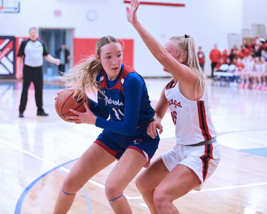 Sophomore Ella Sammons tries to drive under the hoop against George-Little Rock Monday, Jan. 29. H-BC won 52-48. 