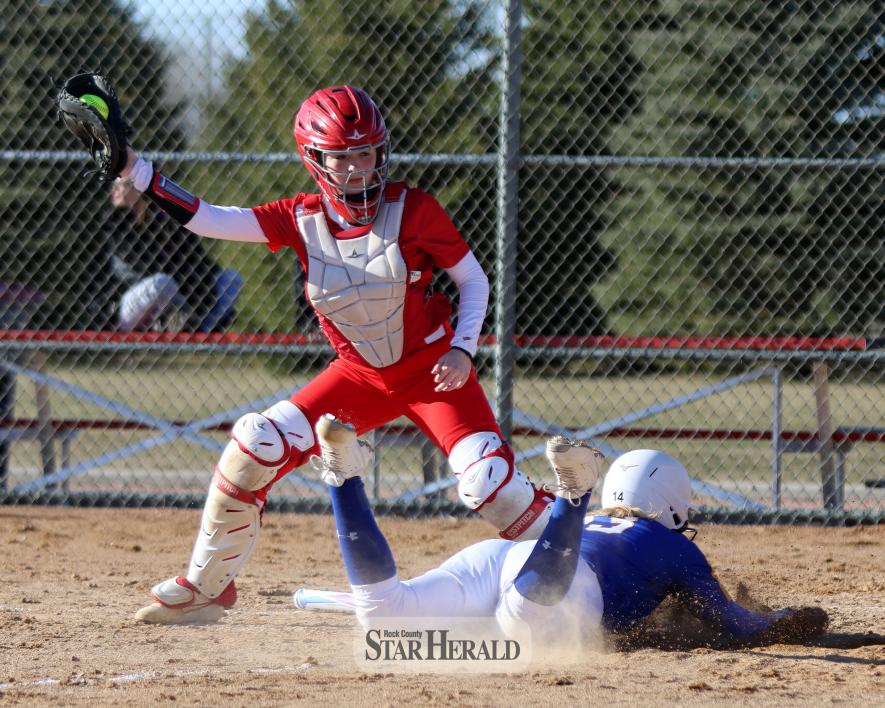 Sophomore Gabbie Nath-Huls makes the catch for a force out at homeplate against Adrian/Ellsworth Thursday, April 4, In Luverne. The Cardinals brought down the Dragons 17-2 in 3 1/2 innings of play on the 15-run rule.