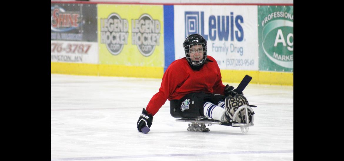 Katie Fick of Luverne skates with the Siouxland Lightning sled hockey team April 7, when the group came to the Blue Mound Ice Arena for the first time to practice. Mavis Fodness/Rock County Star Herald Photo