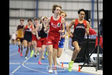Senior Ryan Fick paces himself in the boys’ 1600-meter run Monday, April 1, in Brookings. Fick finished the event in third place with a personal record time of 4:37.85.