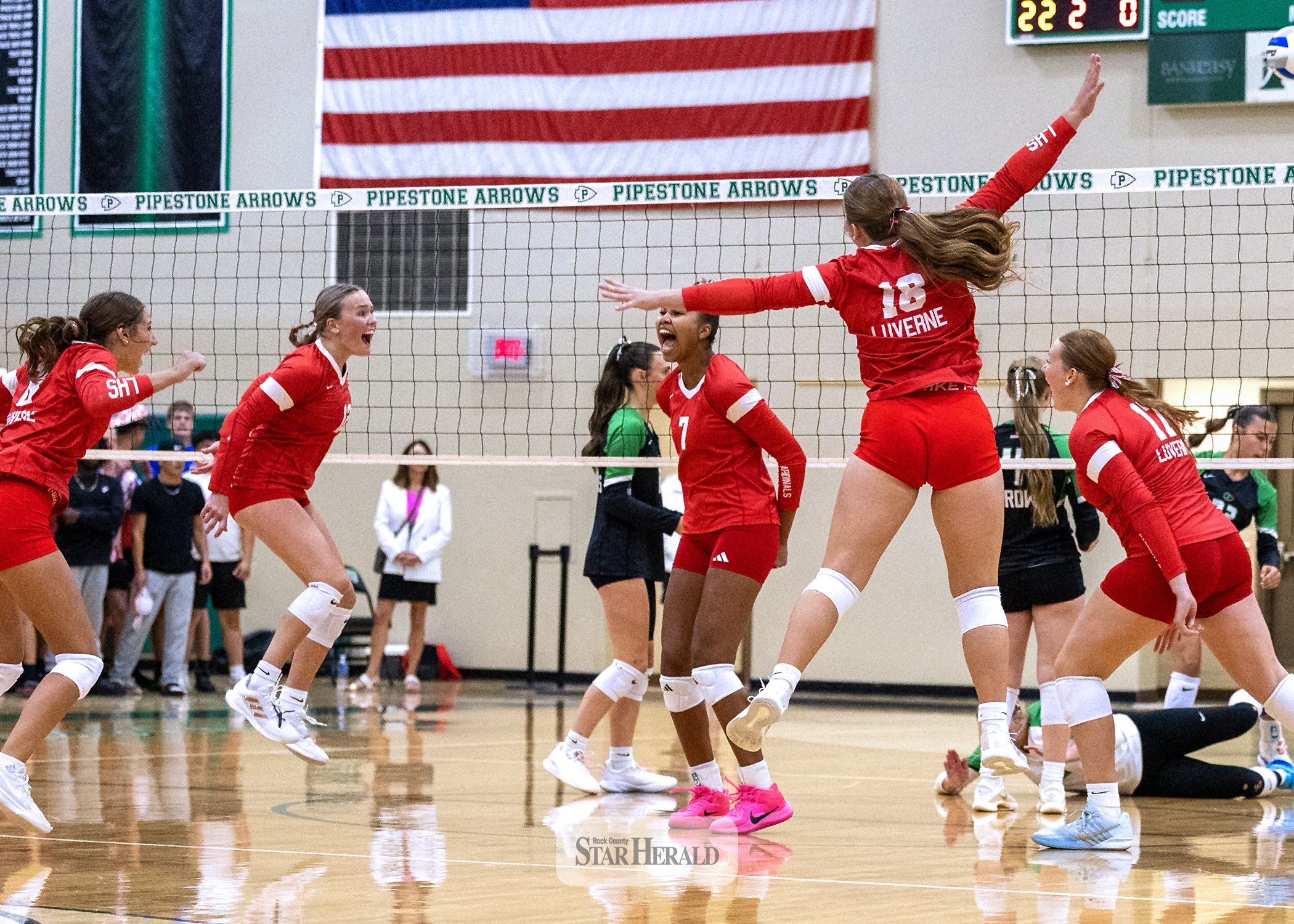 Greg Hoogeveen photo/0917LHSVB1 The Luverne Cardinals celebrate their third set win against Pipestone Tuesday, Sept. 10. Pipestone took the first two sets and the Cardinals rallied to capture the next three for the win.