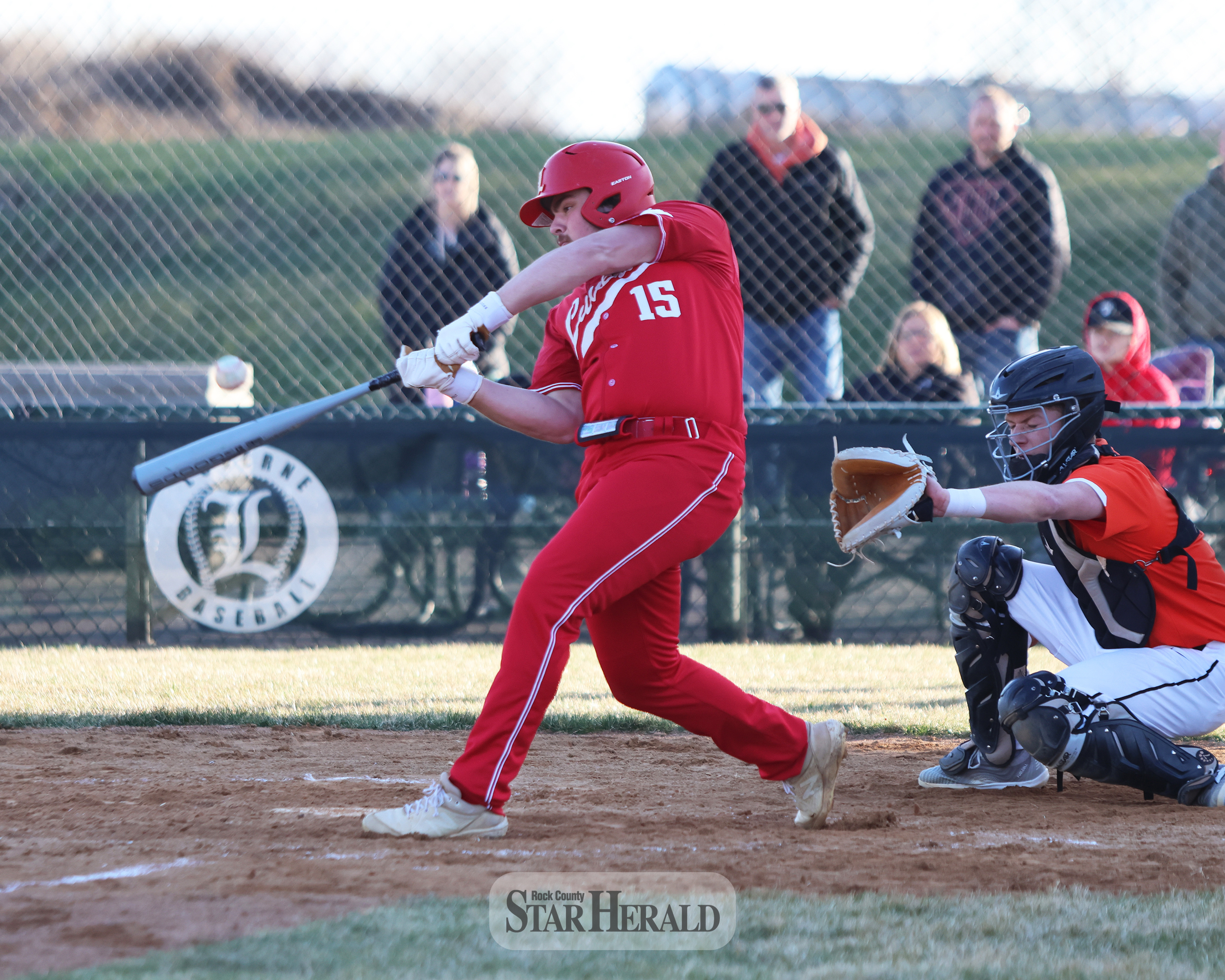 LHS senior Will Serie connects with the ball against Marshall at home Tuesday, April 9. Serie had one hit and two RBIs in the 9-5 loss to the Tigers.