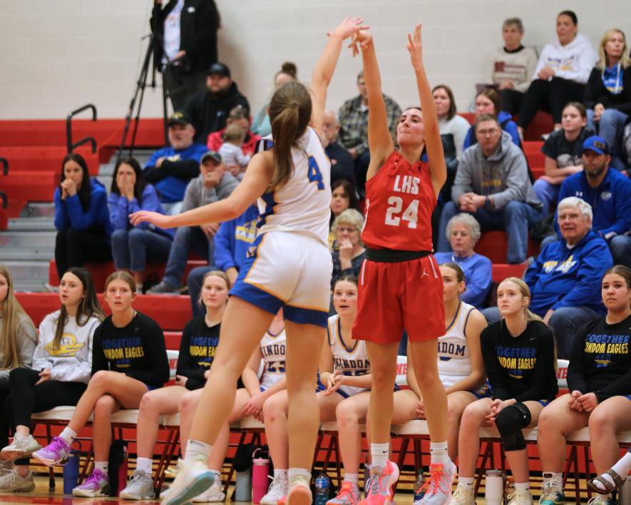 LHS freshman Khloe Visker puts up a 3-point shot against Windom Tuesday, Jan. 2, in Luverne. Luverne fell 68-56 to the Eagles in the game.