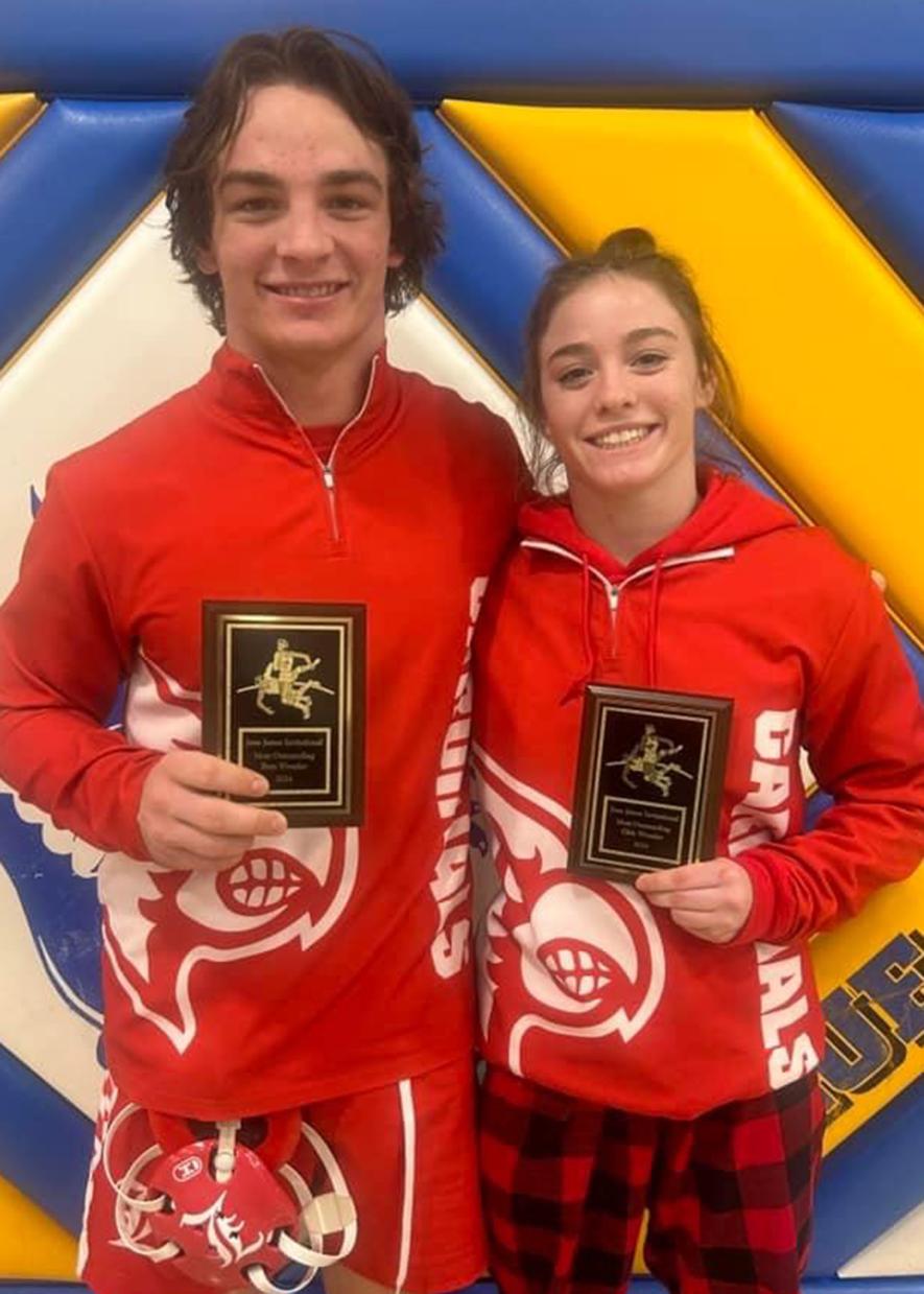 LHS wrestlers senior Sam Rock and his sister sophomore Bernie Rock received “Most Outstanding Wrestler” honors at the Jesse James Invitational Saturday, Jan. 6