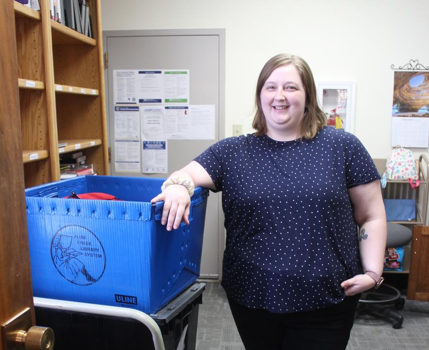 Magie Wieneke, the new Rock County Community Library assistant director, works on inter-library loan requests from the Plum Creek Library System. Mavis Fodness/Rock County Star Herald Photo
