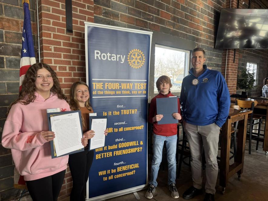 Three Luverne sixth-graders captured top honors at the 2025 Rotary Four-Way Test essay contest. Pictured are Hanna Hess (left), Clara Sandager, Logan Kempema and essay contest coordinator Mike Smith. Sandager’s essay earned first place and will move on to district competition. Submitted Photo