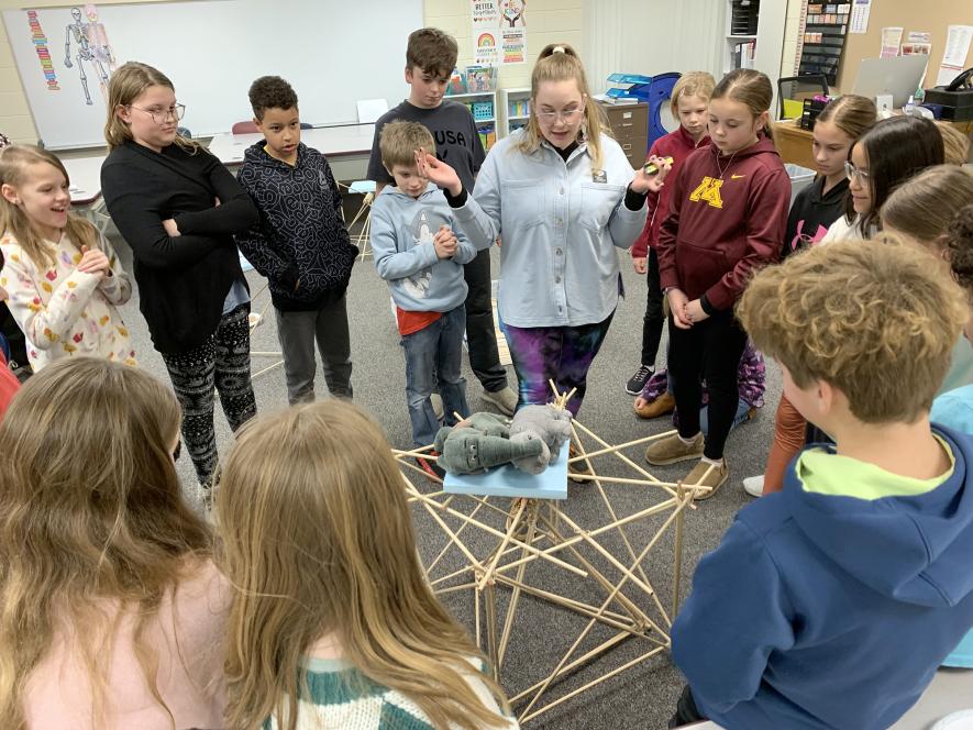 Emilie Stallnick (center) with the Science Museum of Minnesota places weighted stuffed animals on the 2-foot tower constructed by one of the student groups in Peyten Elbers’ fourth-grade class at Luverne Elementary School Thursday afternoon, Feb. 6. Stallnick spent five days with each of the third- through fifth-grade classrooms talking about engineering. Mavis Fodness/Rock County Star Herald Photo