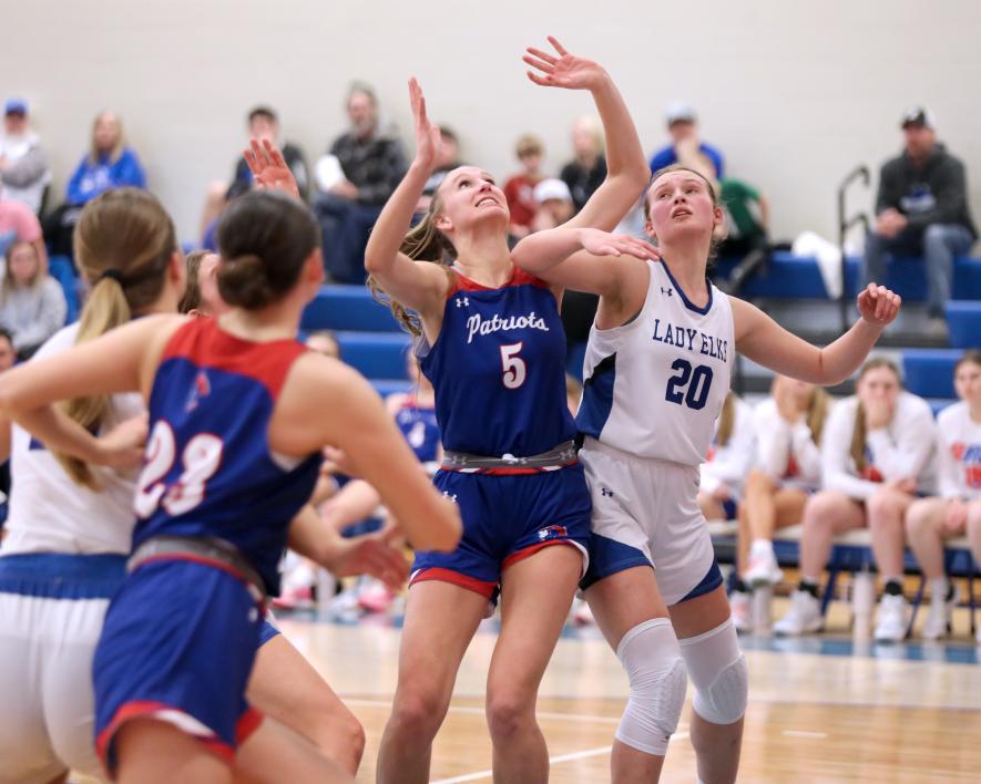 Senior Lanae Elbers fights for position under the hoop for a rebound against Elkton-Lake Benton Monday, Feb. 12, at home. H-BC fell to the Lady Elks 54-48 in the game.