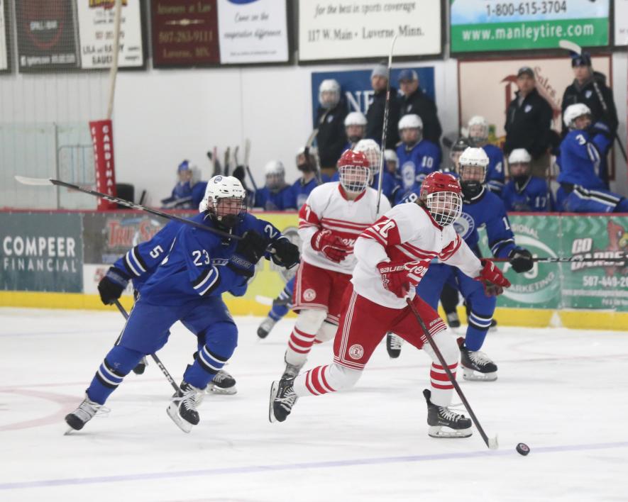 Junior Marcus Vortherms leads a Luverne break away toward the Bulldogs goal followed by junior Alex Schlosser Saturday, Feb. 10, as he scores a goal in the LHS 5-2 win on home ice.