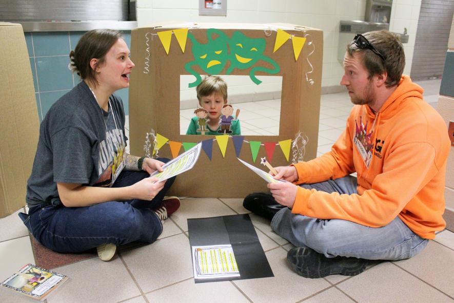 Parents Kylee (left) and James Cohoon complete the “Jack and the Beanstalk Rap” with son Jackson. Mavis Fodness/Rock County Star Herald Photo