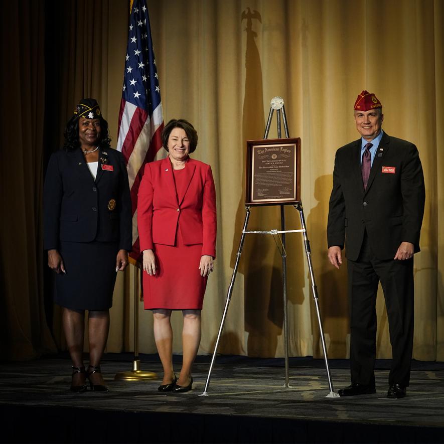 U.S. Sen. Amy Klobuchar (left) received the 2024 Distinguished Public Service Award from American Legion National Commander Daniel Seehafer during the organization’s Washington Conference in February.