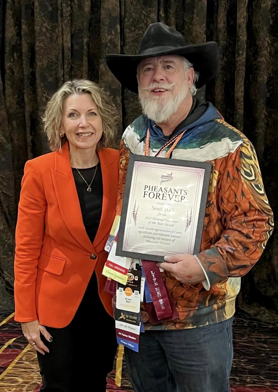 Star Herald Outdoor columnist and 40-year wildlife conservationist Scott Rall earned national recognition Saturday as “Volunteer of the Year” during Pheasant Fest in Sioux Falls. He’s pictured with National Pheasants Forever CEO Marilyn Vetter Saturday afternoon at the Sioux Falls Convention Center.
