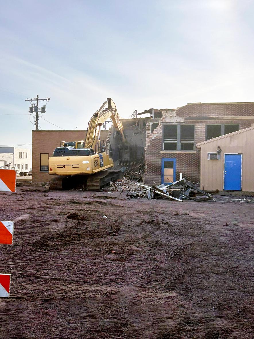 DRC Inc. of Litchfield began demolition work on the west side of the former Hills-Beaver Creek High School in Hills Tuesday morning. Photo courtesy of the Hills-Beaver Creek School District