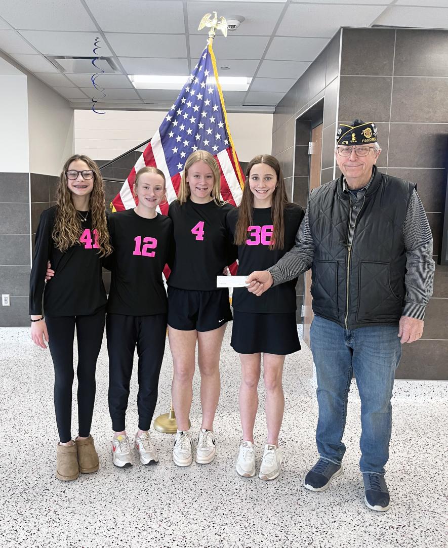 Keith Schmuck (far right) recently presented a check from the Hardwick American Legion Post 478 to the Luverne JO volleyball program to help cover the cost of jerseys. Volleyball players accepting the check are Harper Phelps (left), Allison Beyer, Lucy Bose and Ingrid Schmuck