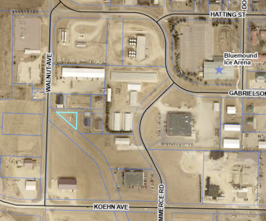 Phil and Louella Voigt purchased a small trianglar-shaped lot at 805 Walnut Service Drive for the purpose of constructing an L-shaped multi-use building for a workshop and storage rental space. This was the final remaining lot to be sold in this subdivision where smaller, shop-type buildings are allowed.