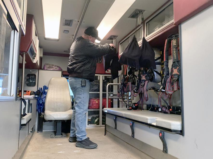 In this February 2024 file photo, Hills Area Fire Department chief Jared Rozeboom places equipment in the box of the current rescue truck. Work had begun on replacing the 1996 truck. However, after 18 months of research, Rozeboom said taking the existing ambulance box and placing in on a 2024 chassis is the best cost option. Rock County Star Herald File Photo