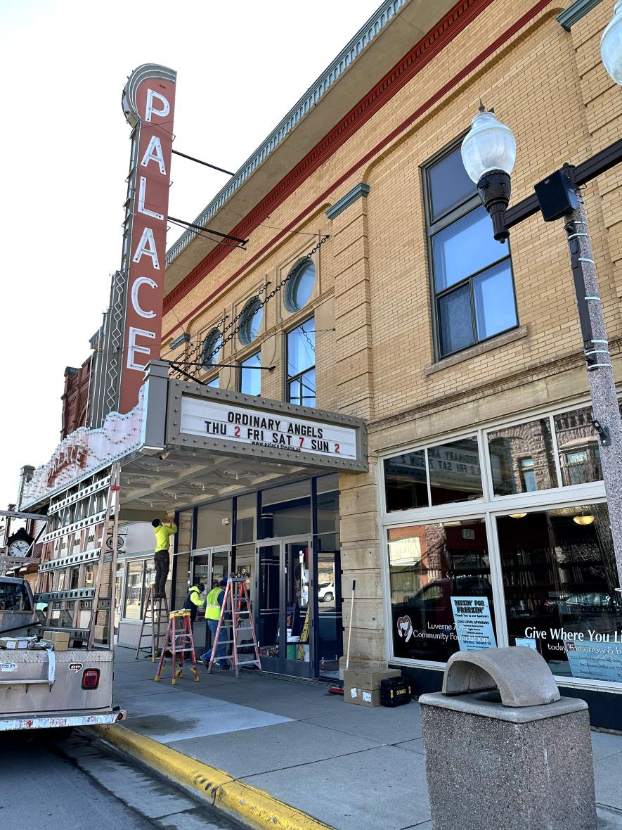 Workers with G&D Viking Glass, Sioux Falls, install a new street level entryway at the historic Palace Theatre in Luverne Tuesday. Lori Sorenson/Rock County Star Herald Photo