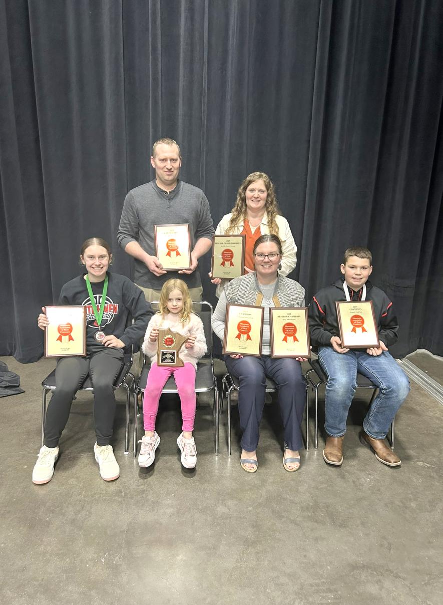 V&M Locker, Leota, earned several awards at the Minnesota Association of Meat Processors Convention Product Show March 14 -15 in St. Cloud. Pictured are (back) V&M Locker owners Chad and Julie Ruiter, (front) their children (Cara, 15, Alex, 12, and Leah, 6) and V&M Retail Meat Manager Bethany Olsem. Submitted Photo