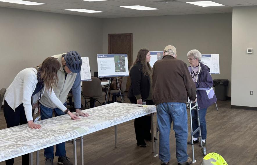 About two dozen people attended the April 23 open house at the East Main Street trailhead building to learn about the Highway 75 construction planned for 2026. Pictured are (from left) MnDOT public engagement coordinator Anne Wolff, resident Claude Van Driel, Mary Loeffler of MnDOT and residents Harold and Toni Van Wyhe. Lori Sorenson/Rock County Star Herald Photo