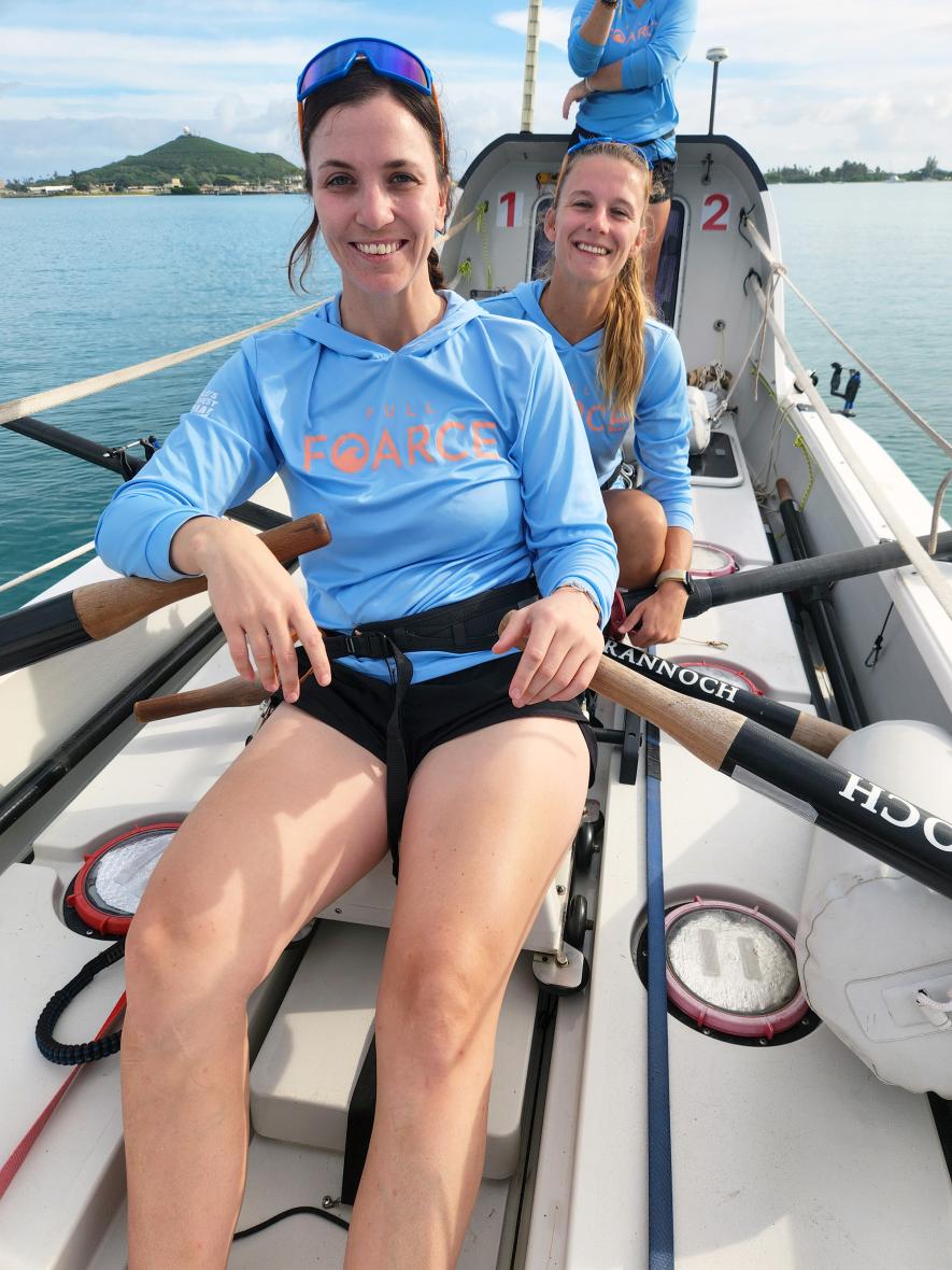 Caitlin Miller poses for a picture with her rowing partner, Laura Newton, who along with Elaina Loveless and Cassidy Hurd (not pictured) will row the 28-foot boat called the “Spitfire” from Monterey, California, across the Pacific Ocean to Hanalei Bay, Hawaii, beginning Saturday, June 8. Their team name is Full FOARce. Mavis Fodness/Rock County Star Herald Photo