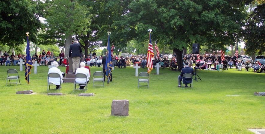 Terrie Gulden (at podium), a VFW member, announced Monday’s event. Mavis Fodness/Rock County Star Herald Photo