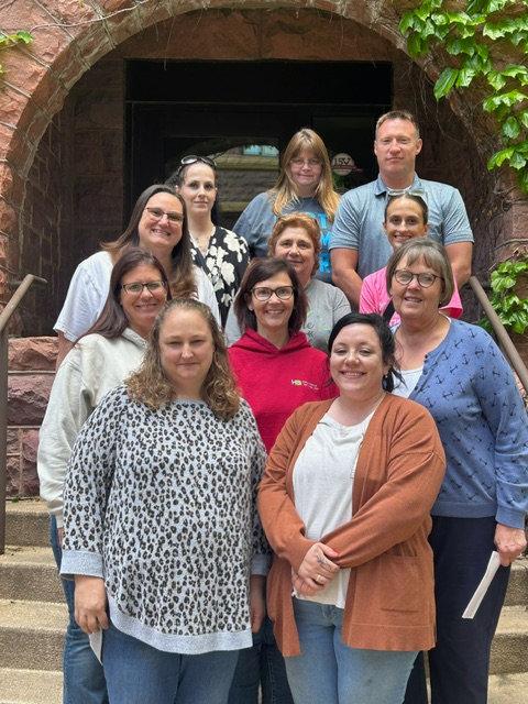 Pictured are (front row, from left) Amber Davis, Brittany Fahrenholtz, (second) Kelly Halverson, Stacy Olson, Chamber Director Jane Lanphere (third) Dani Blom, Lori Holtz, Kayla Wolfe, (back) Amanda Johnson, Keri Vanderbeek and Derek Hamm. Submitted Photo