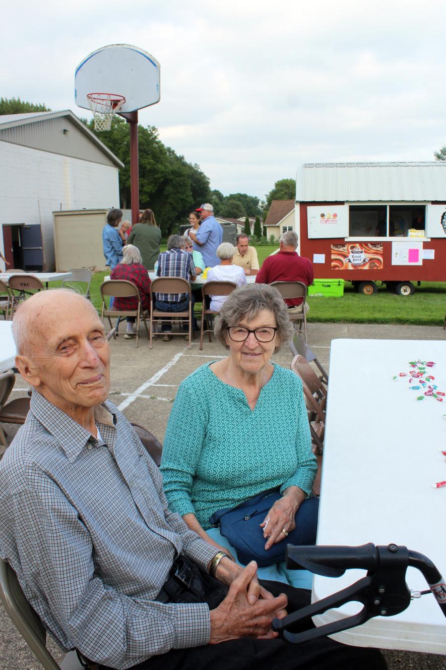 Albert and Frances Haak attend the Schoolyard Celebration for the 75th anniversary of Hills Christian School Monday evening. In 1949, Albert, an eighth-grader, was the first graduate of the school. Frances graduated in 1952. Mavis Fodness/Rock County Star Herald Photo