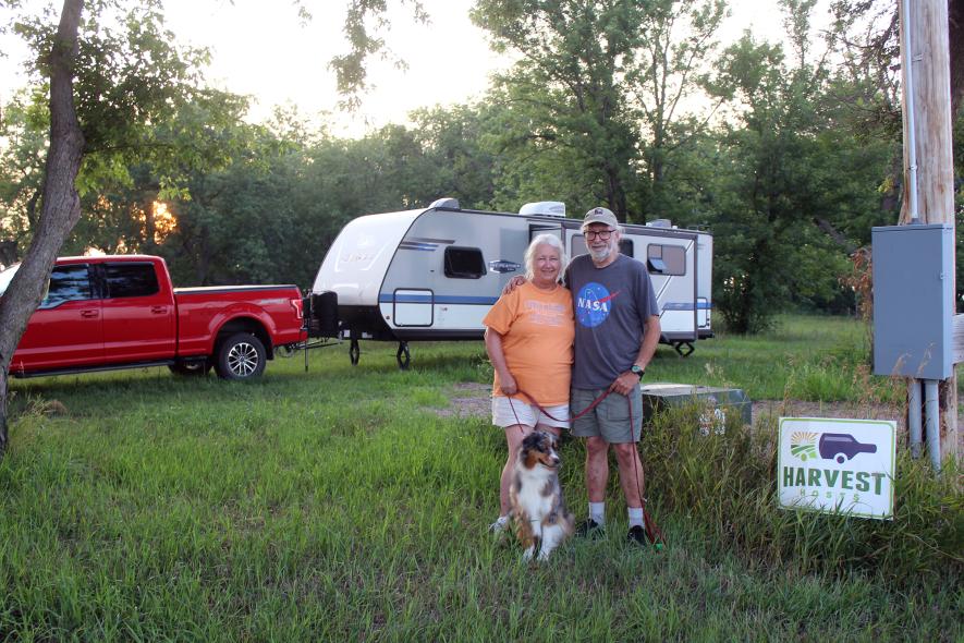 Canadian travelers Ellen and Curtis Abbott and their dog, Misty