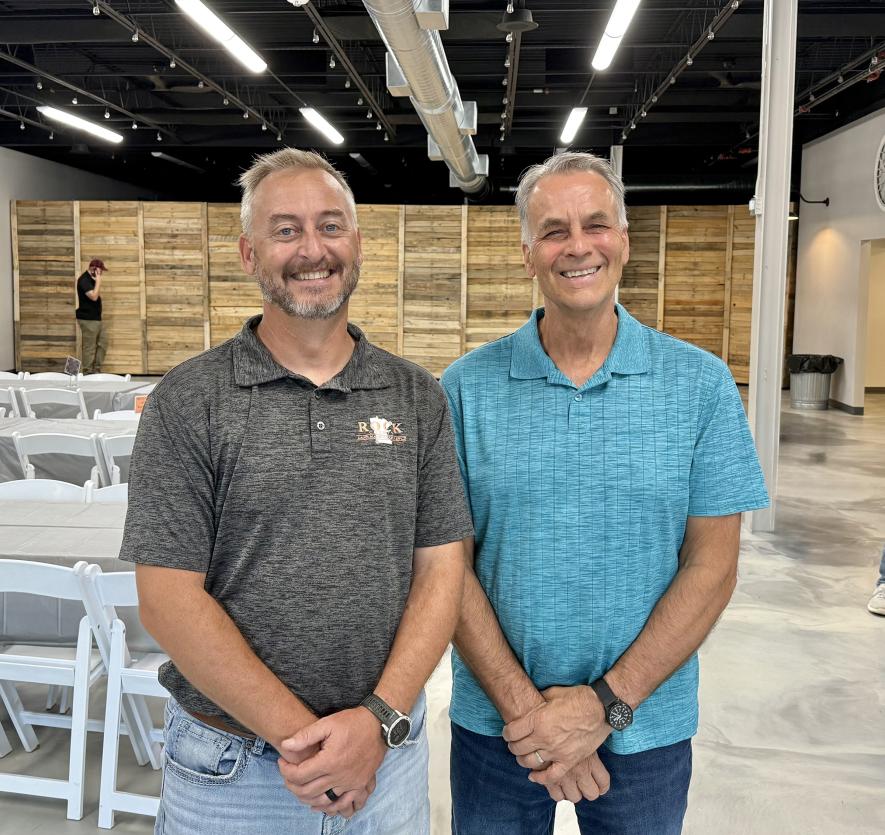 Arlyn Gehrke (left) officially takes over this week for Doug Bos who is retiring from 29 years with the Rock County Land Management Office and Rock County Soil and Water Conservation District. They’re pictured at Bos’s retirement party Thursday afternoon at Big Top Tents and Events. Lori Sorenson/Rock County Star Herald Photo