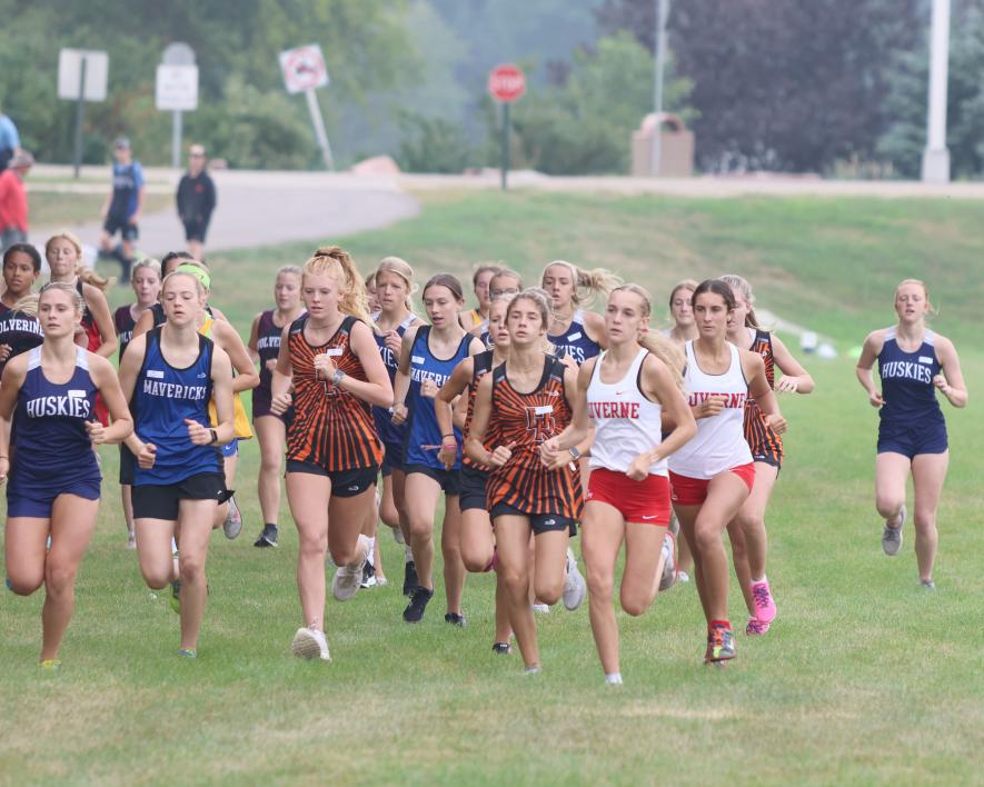 Luverne senior Jenna Debates and freshman Khloe Visker take off in the girls’ varsity 5,000 meter event Saturday, Sept. 9 in Luverne. DeBates finished the race in first place with a time of 18:33.70 and Visker finished in 10th place with a time of 21:39.75.