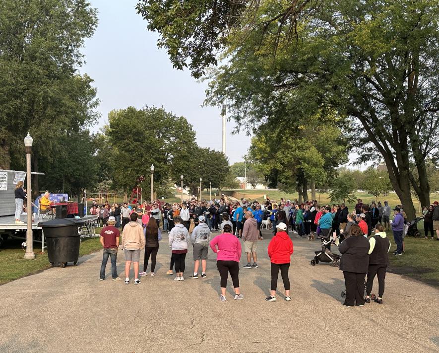 Luverne City Council member and Luverne High School teacher Caroline Thorson addresses a group at the start of Saturday’s Out of the Darkness suicide awareness walk in Luverne City Park. The event attracted nearly 400 participants and raised $21,000 for the American Foundation for Suicide Prevention.