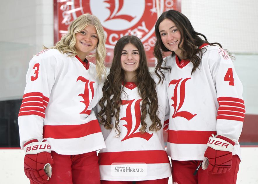 Greg Hoogeveen photo/100 points Three LHS girls’ hockey players recently reached the 100-point career marks. They are left, junior Tenley Behr, senior Ella Apel and junior Izzy Steensma.