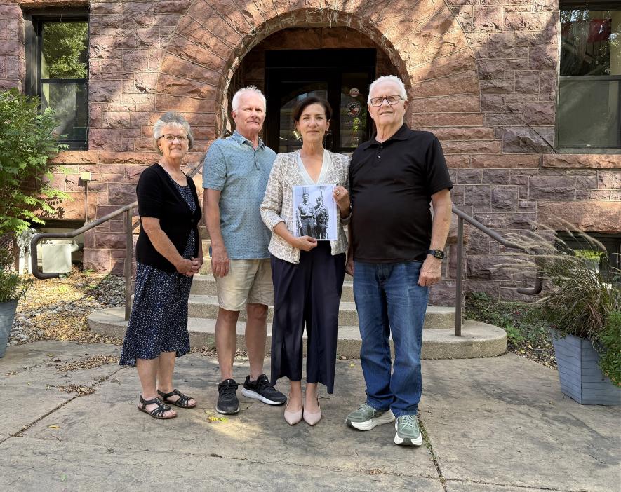 Elmer Hovland’s children (from left) Christine, Mark and Jon met with author Nina Willner at the Herreid Military Museum where an exhibit is planned for Hovland’s war contributions and Willner’s research. “We didn’t have a clue. He was very humble,” Christine said when asked about their father’s heroism.