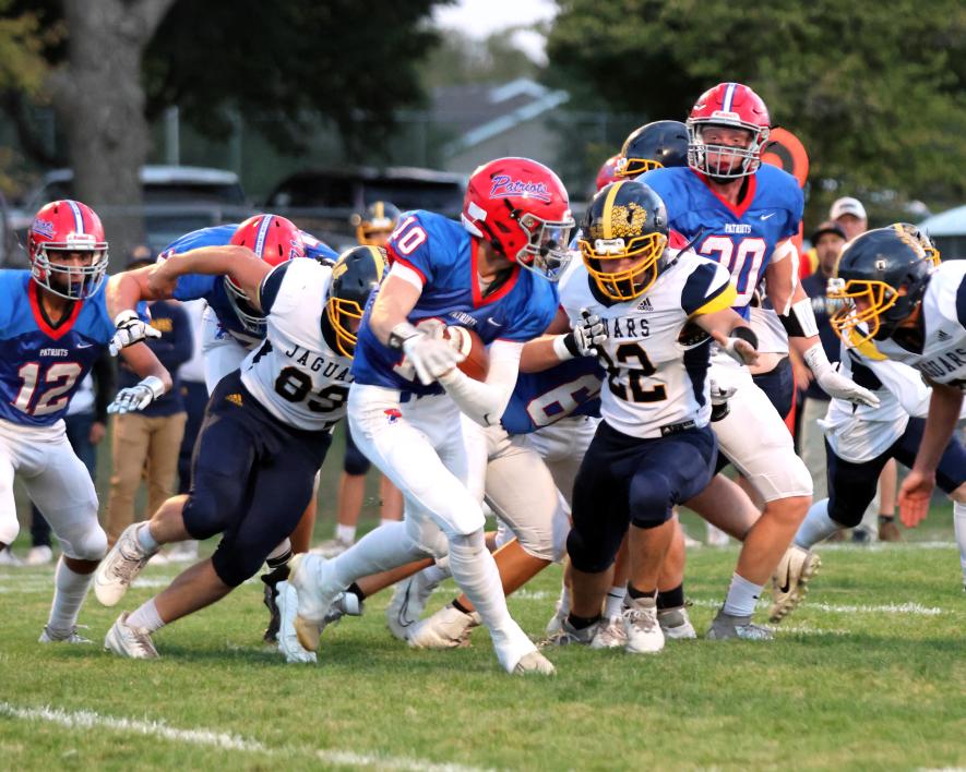Senior Justin Roelfs carries the ball against Renville Friday, Sept. 29, in Hills. Roelfs rushed for 23 yards in the Patriots’ 45-14 win. H-BC is now 5-0.
