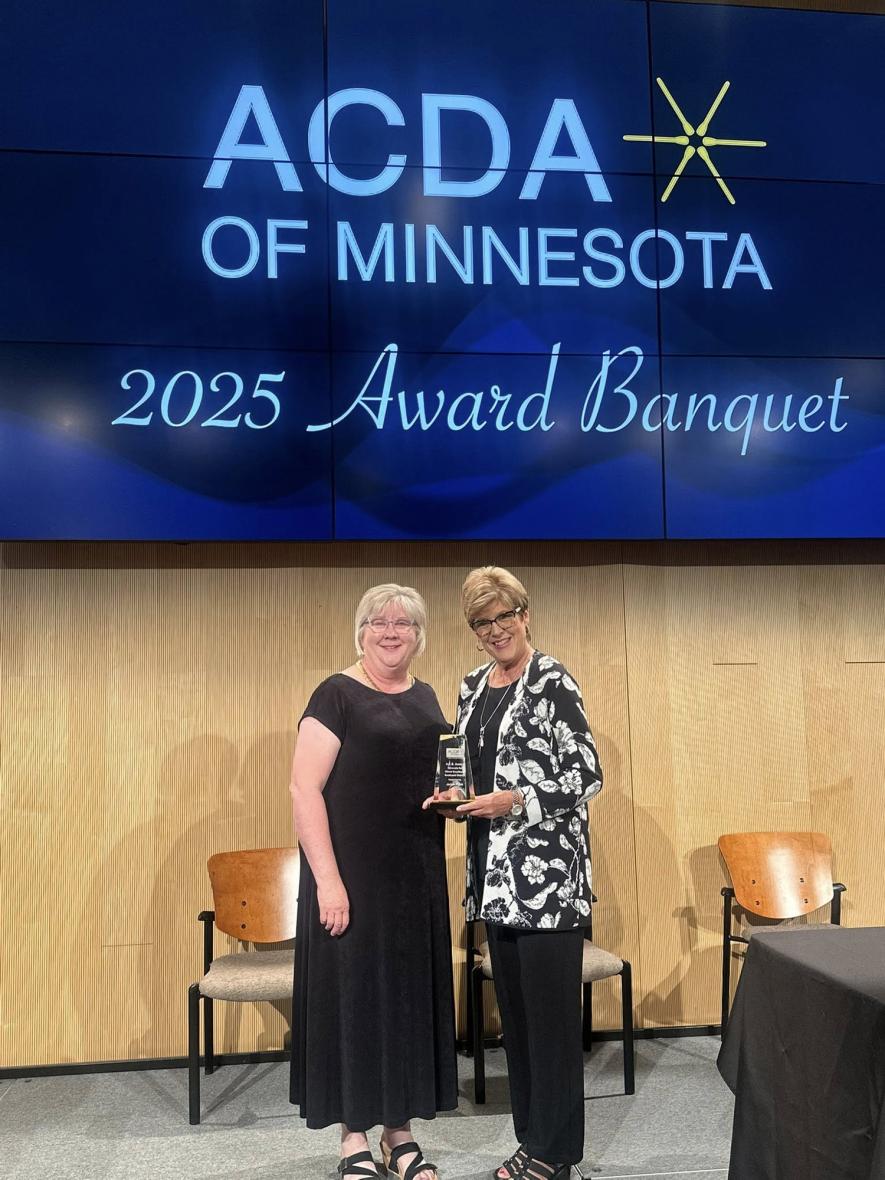 Janine Papik (right) earned the Advocate for Choral Excellence Award for her contributions to choral music in her community. She is pictured with Luverne Public Schools choir director Seana Graber at the ACDA-MN annual Summer Dialogue Directors’ Conference award banquet July 31 in Moorhead.