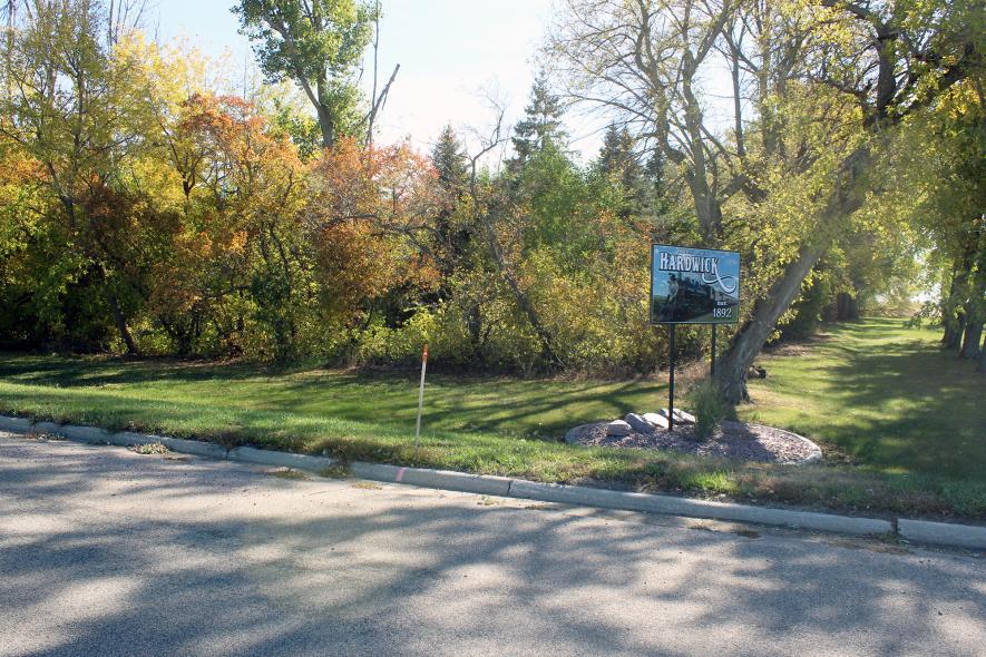 The city of Hardwick is working with DGR Engineering out of Rock Rapids to develop an access road to the seven-acre Scott Addition. Stakes mark the entrance through a tangle of trees that the city will remove to clear the way for access to the future fire hall and the newly purchased commercial and residential tracts by the VanDerBrink family for future businesses and homes. Mavis Fodness/Rock County Star Herald Photo