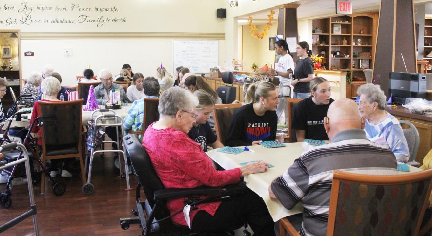 “Introduction to Healthcare Careers” students work on interpersonal skills Thursday afternoon, Oct. 16, at Poplar Creek/The Oaks in Luverne. The students invited residents of the assisted living facility to participate in “Birthday Bingo.” Mavis Fodness/Rock County Star Herald Photo