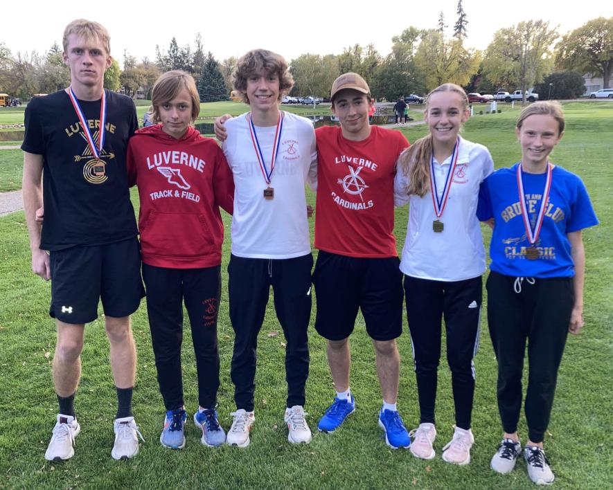 LHS cross country runners honored at the Big South Championship on Tuesday, Oct. 17, are (from left) junior Dylan Ommen, all-conference; freshman Marcus Papik, honorable mention; senior Ryan Fick, all-conference; junior Leif Ingebretsen, honorable mention; senior Jenna DeBates, all-conference; and seventh-grader Summer Mollberg, all-conference.