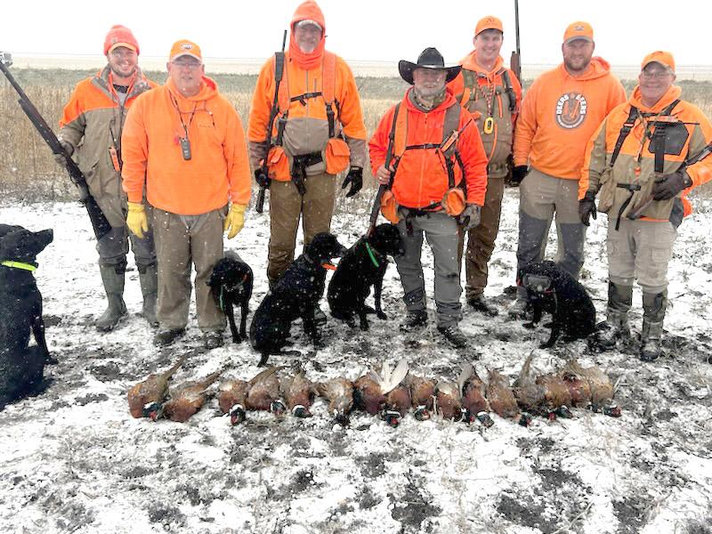 The “EPIC hunt” in Rock County involved (from left) Jeremy Hoff, Bryan Boltjes, Doug Tate, Scott Rall, Mark Boelman, Brent Dinger, Nathan Holt and (not pictured) photographer Don Dinger and Brady Dinger, who was with his wife and new baby born at 10 p.m.