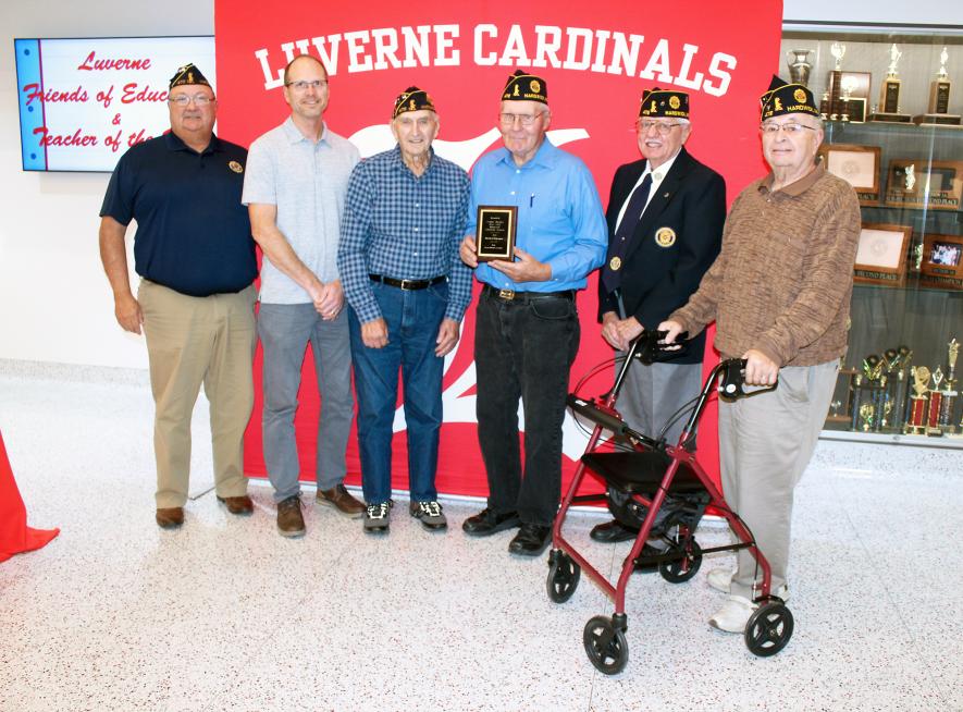 Representatives from the Arthur Moeller American Legion Post 478 in Hardwick accept the 2024 Luverne Education Association Friend of Education award Monday afternoon. Pictured (from left) are Post Commander Kyle Oldre, Dave Haugom, Lowell Ahrendt, Roy Moeller, Don Bryan and Wes Pierson.Mavis Fodness/Rock County Star Herald Photo