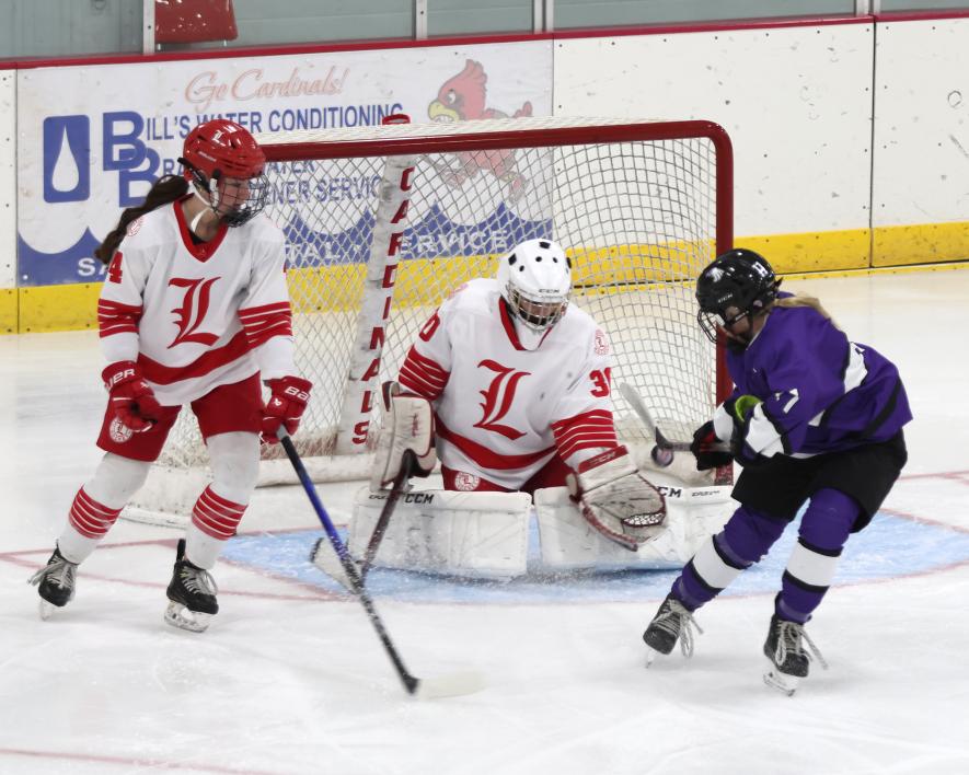 LHS goaltender, sophomore Emma Saarloos, stops a New Ulm shot Tuesday, Nov. 14, in Luverne. Saarloos stopped 25 of 27 shots from the Eagles in the Cardinals’ 0-2 loss. The Cardinals beat Windom 10-1 Nov. 16 on the road.
