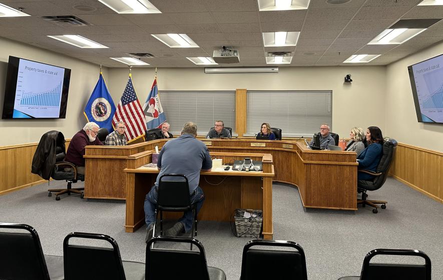 Isaac DeBoer (center) addresses Luverne City Council members during the annual Truth in Taxation hearing Tuesday night, Dec. 12, in Luverne City Hall Council Chambers. From left are City Attorney Ben Vander Kooi, council members Scott Viessman and Kevin Aaker, Mayor Pat Baustian, council members Caroline Thorson and Dan Nath, City Administrator Jill Wolf and city clerk Jessica Mead. Lori Sorenson/Rock County Star Herald Photo