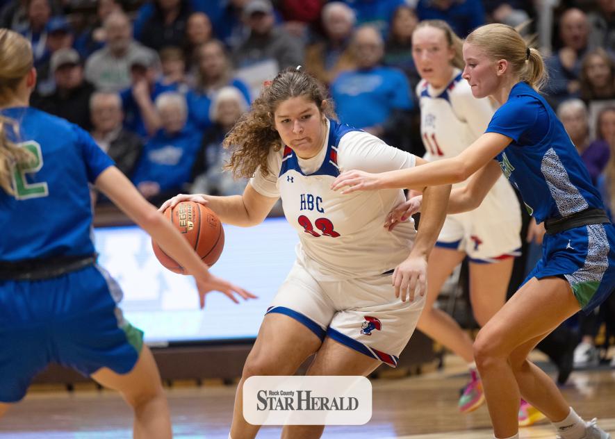 Lady Pates junior Izzy Wysong drives the ball under the hoop against MACCRAY Thursday, March 6, in Marshall. The Patriots fell 54-44 to the Wolverines in the Section 3 championship game.