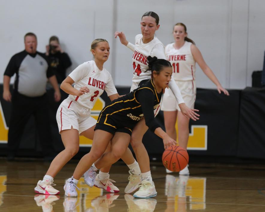 Seniors Kayla Bloemendaal, No. 2, and Kiesli Smith, No. 14, pressure a Southwest Minnesota Christian player in Edgerton Friday, Dec. 1. The Eagles beat the Cardinals 51-42 in the game.