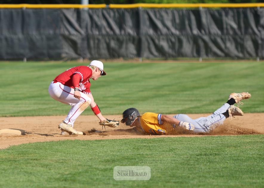 Junior Blake Sauer lays a tag on an Adrian player trying to steal second base Thursday, May 22, at home. Luverne beat Adrian/Ellsworth 7-1.